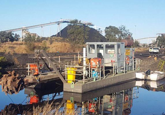 Coal mine site dredging of settling pond Queensland